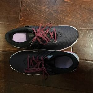 Women’s purple and pink Nike shoes size 9.5